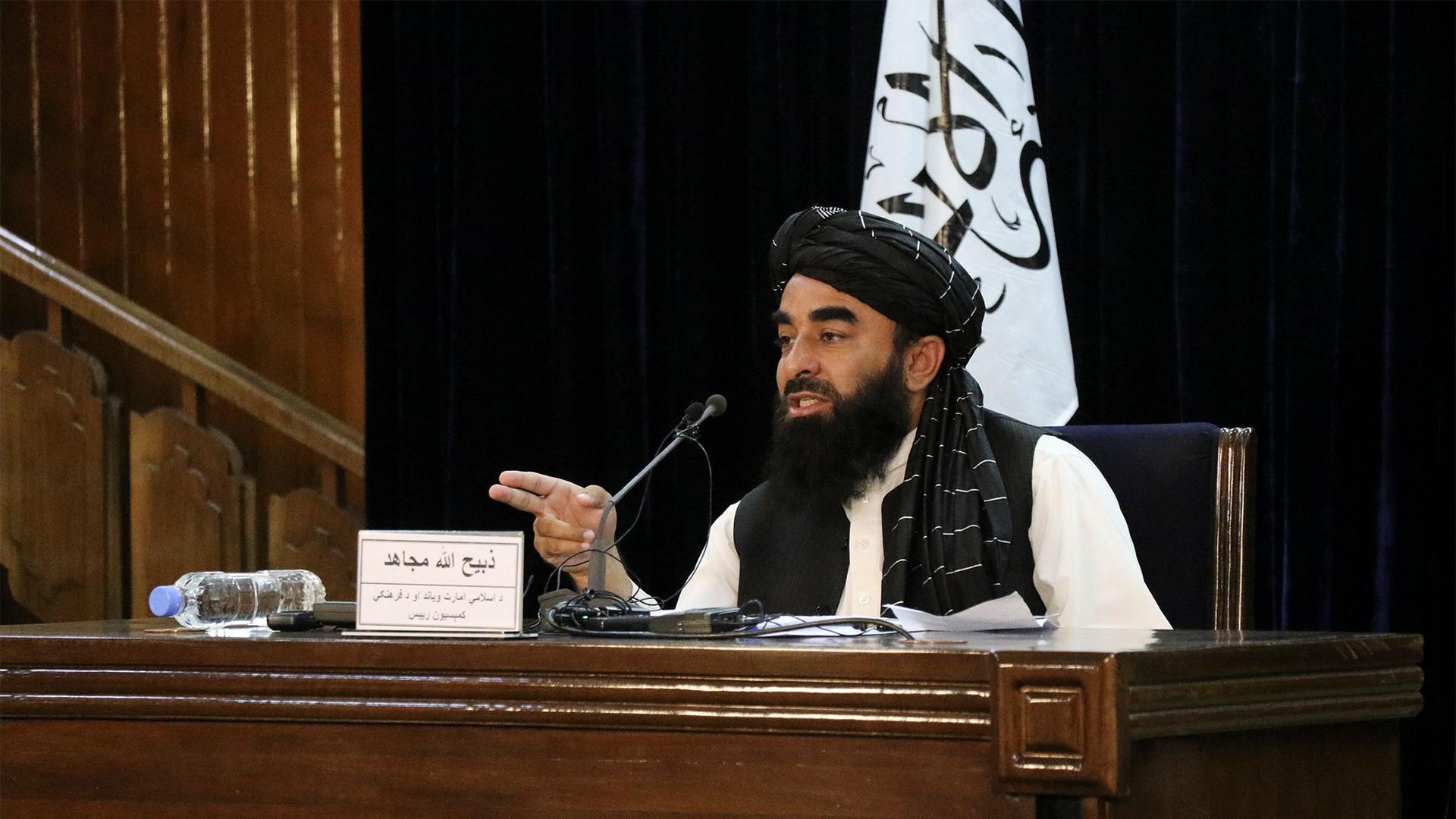 Taliban spokesman Zabihullah Mujahid speaks during a press conference in Kabul, Afghanistan