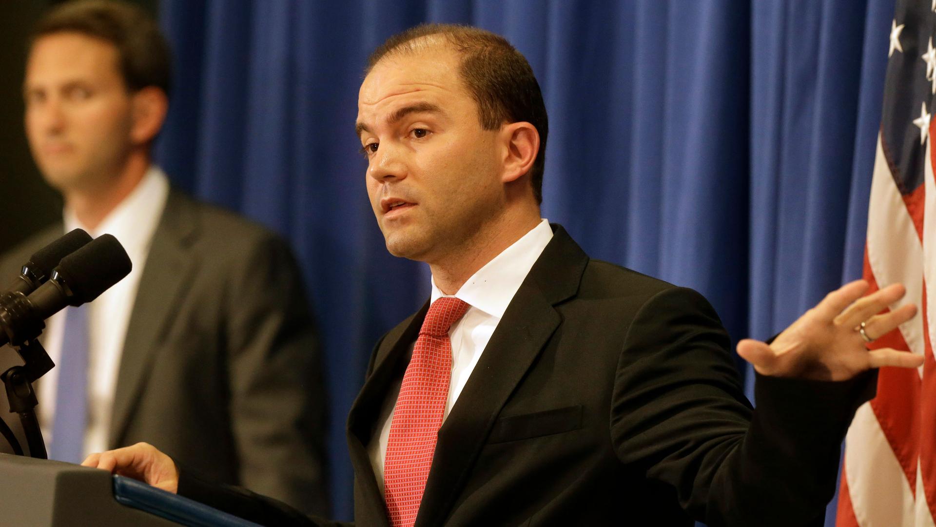 Deputy National Security Adviser for Strategic Communications and Speechwriting Ben Rhodes is accompanied by Deputy Press Secretary Eric Schultz at a press briefing at Martha's Vineyard