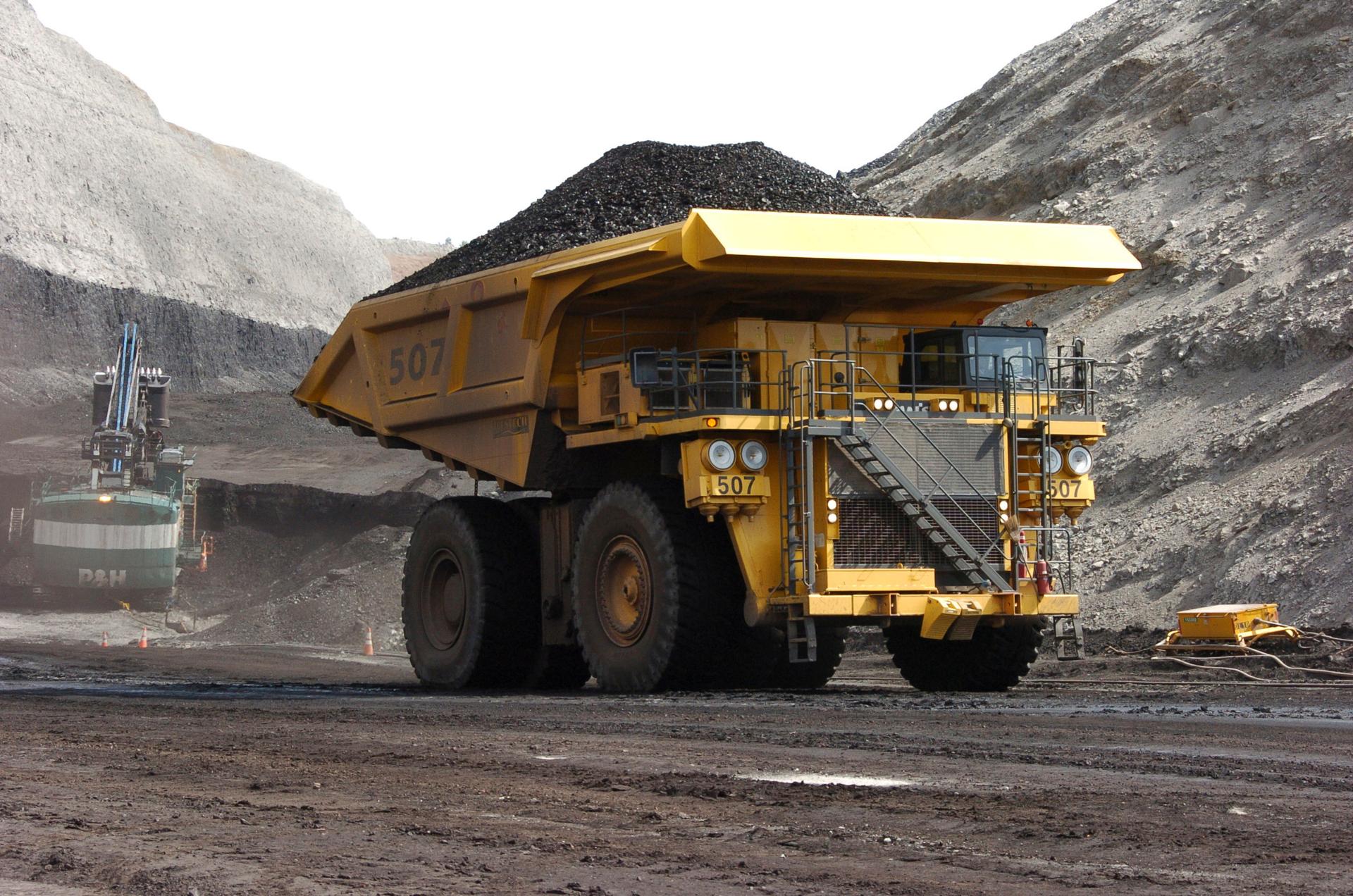 In this April 4, 2013, file photo, a mining dumper truck hauls coal at Cloud Peak Energy's Spring Creek strip mine near Decker, Montana.