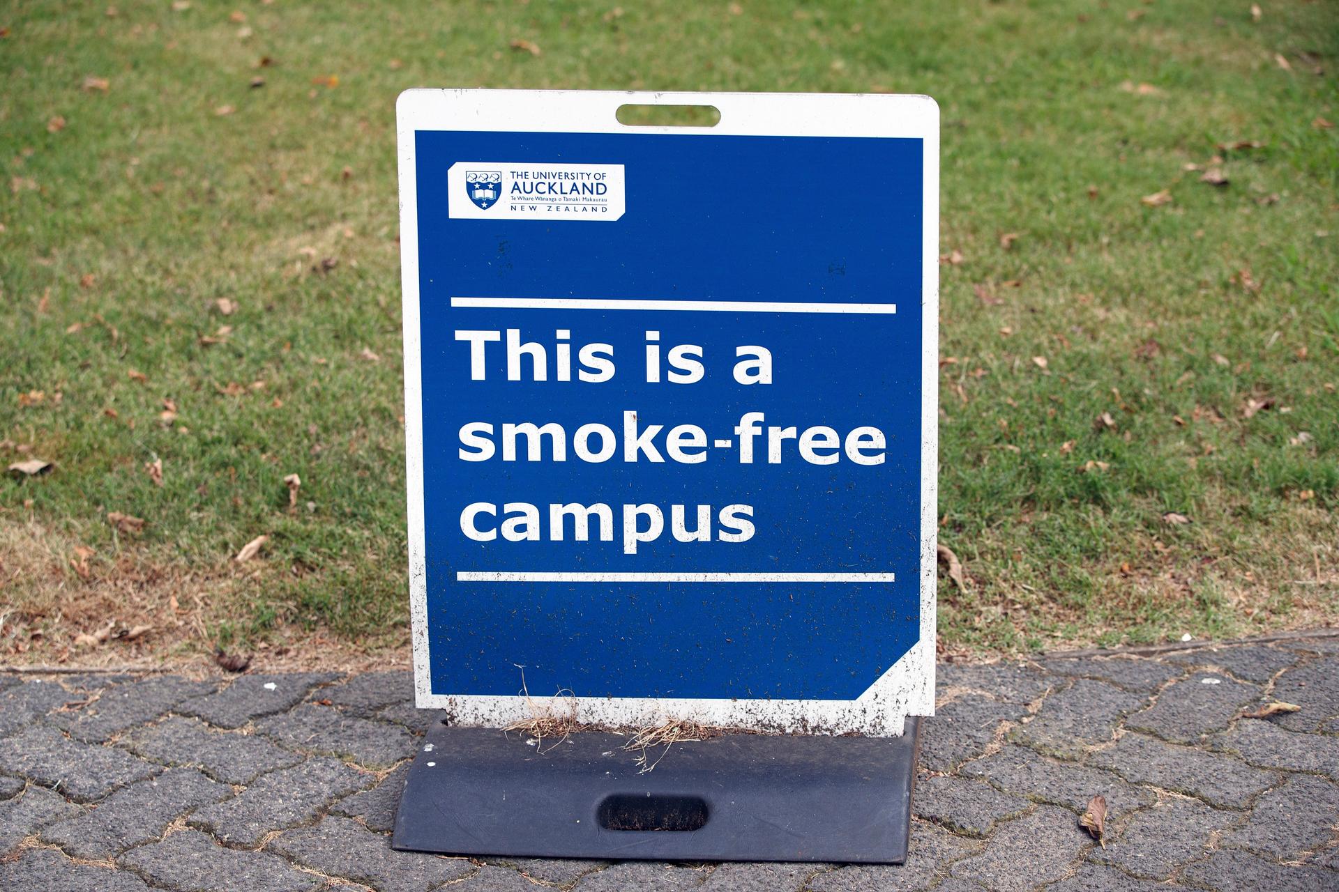 A sign indicates that the University of Aukland campus is smoke-free in Auckland, New Zealand, Dec. 9, 2021. New Zealand's government believes it has come up with a unique plan to end tobacco smoking, a lifetime ban for those aged 14 and under.