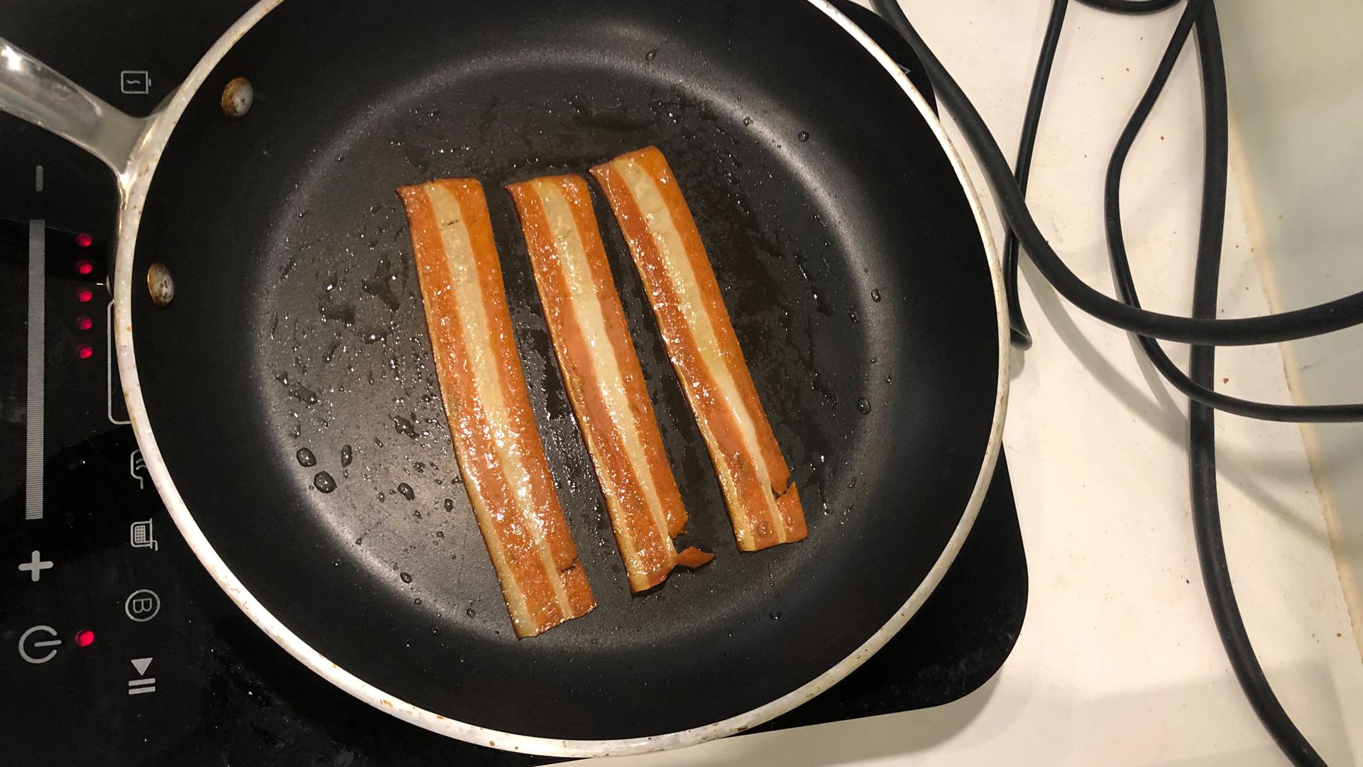In a hot pan, the streaky bacon made by La Vie starts curling within minutes, bubbling and crisping…just like, well, bacon.
