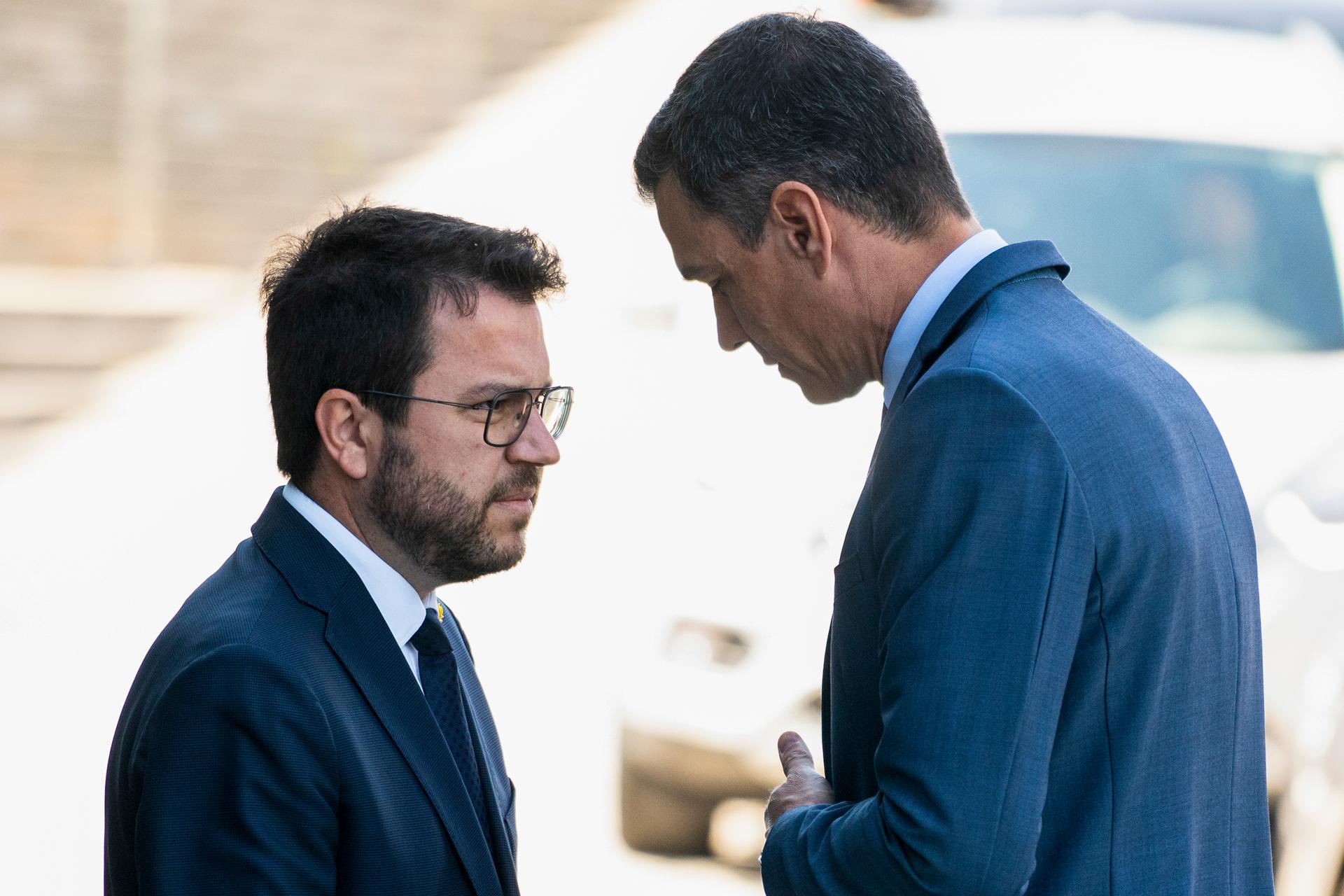 Spanish Prime Minister Pedro Sanchez, right, and Catalonian regional President Pere Aragones during a meeting at the Cercle d'Economia forum in Barcelona, Spain, Friday, May 6, 2022. 
