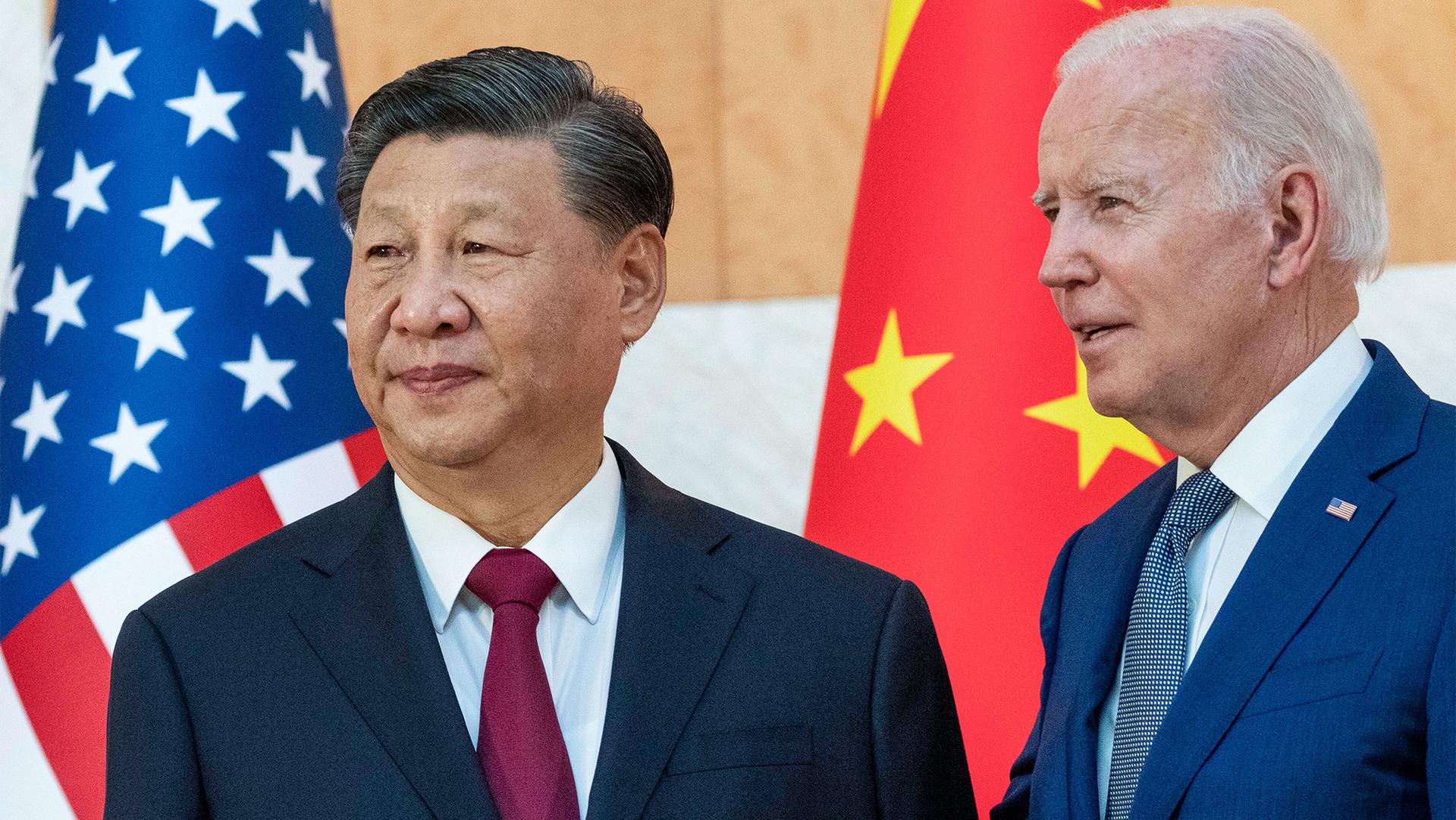 US President Joe Biden stands with Chinese President Xi Jinping before a meeting on the sidelines of the G-20 summit in Bali, Indonesia, Nov. 14, 2022.