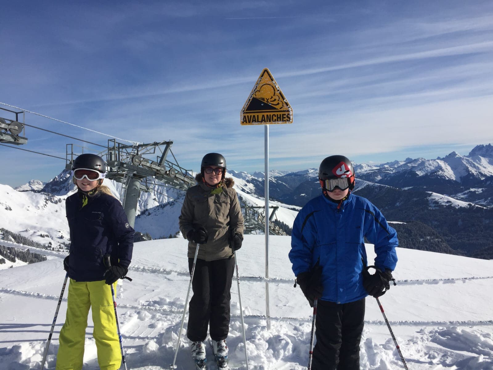 family photo on a snowy slope