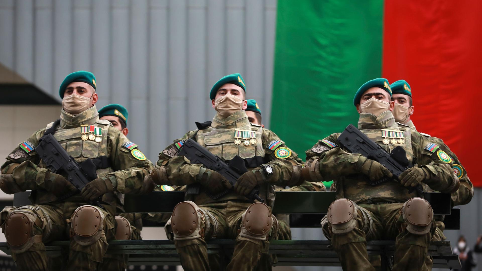 Azerbaijani troops attend the parade in Baku, Azerbaijan, Thursday, Dec. 10, 2020.