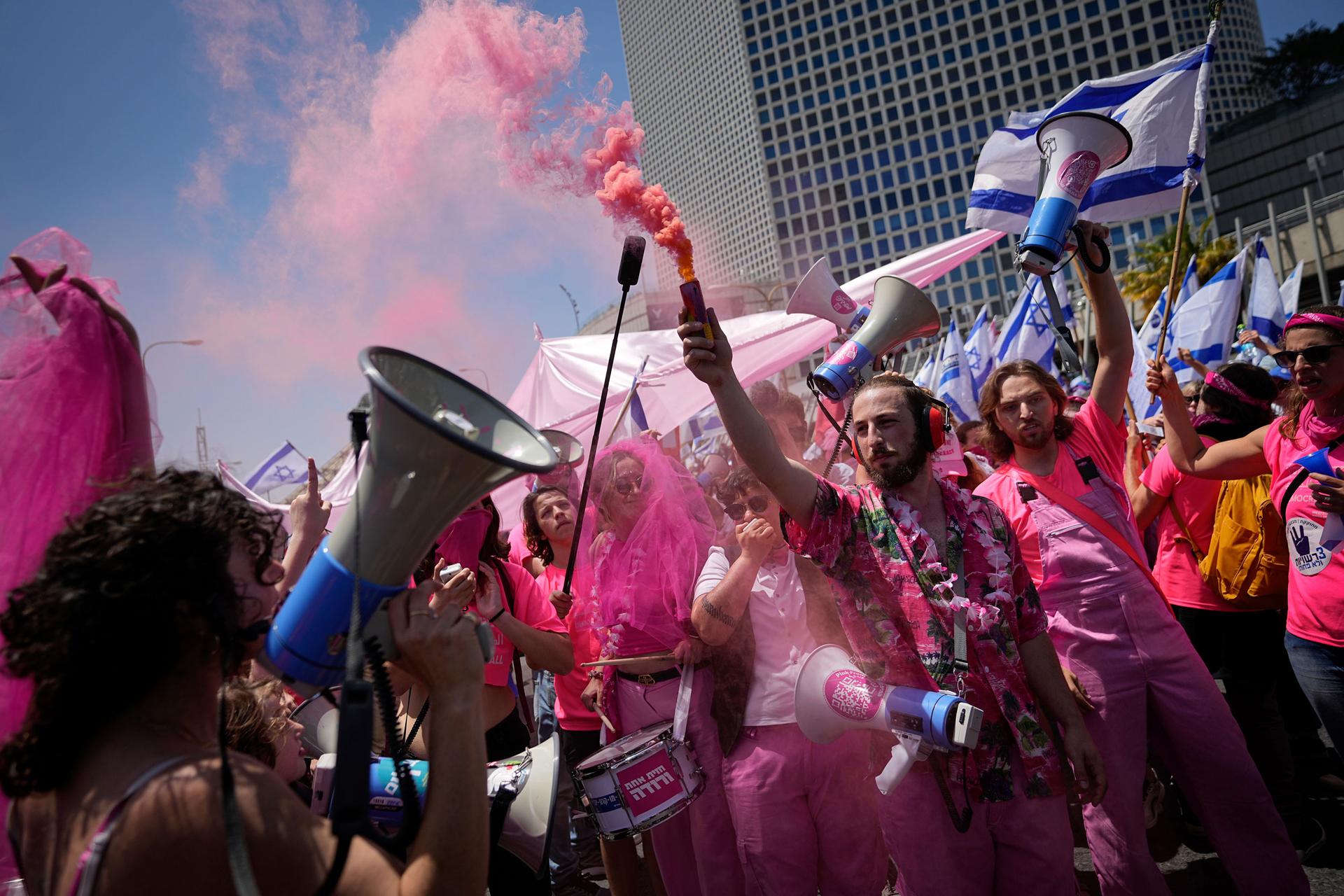 Israelis protest against plans by Prime Minister Benjamin Netanyahu's government to overhaul the judicial system, in Tel Aviv, Israel, Thursday, May 4, 2023. 