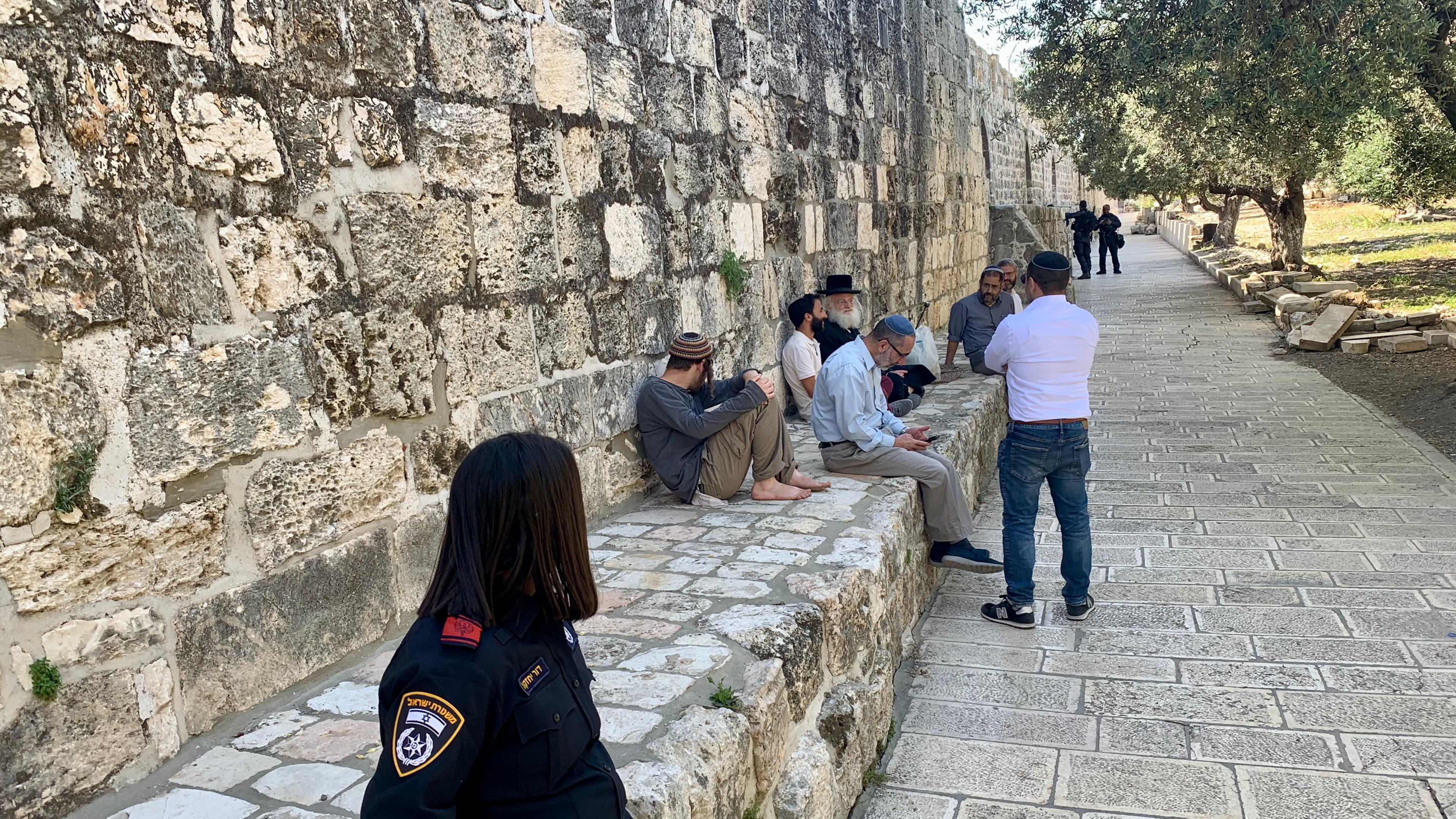 people at the wall