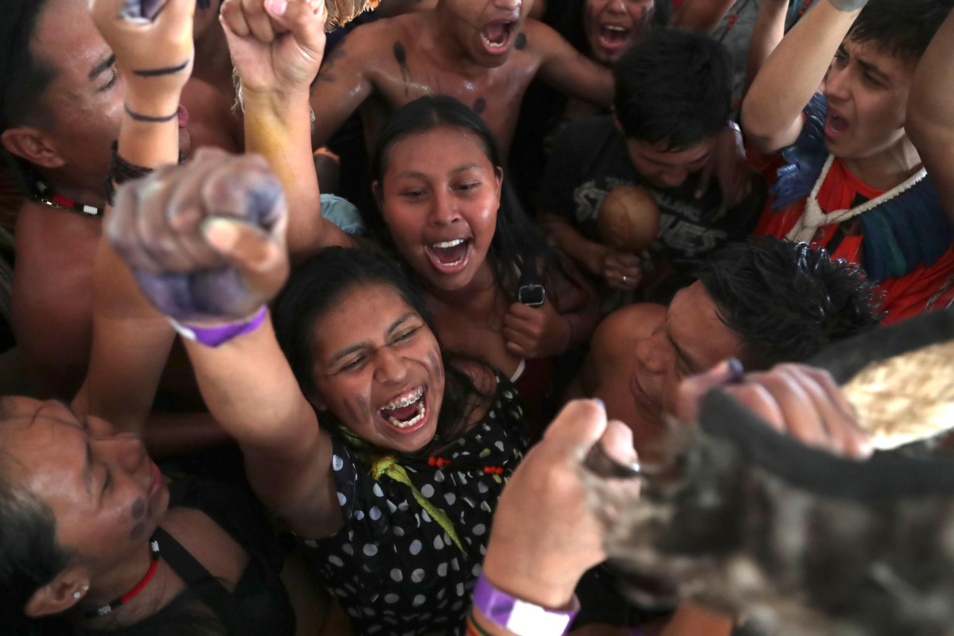 ndigenous people celebrate a Supreme Court ruling to enshrine Indigenous land rights, in Brasilia, Brazil, Sept. 21, 2023.