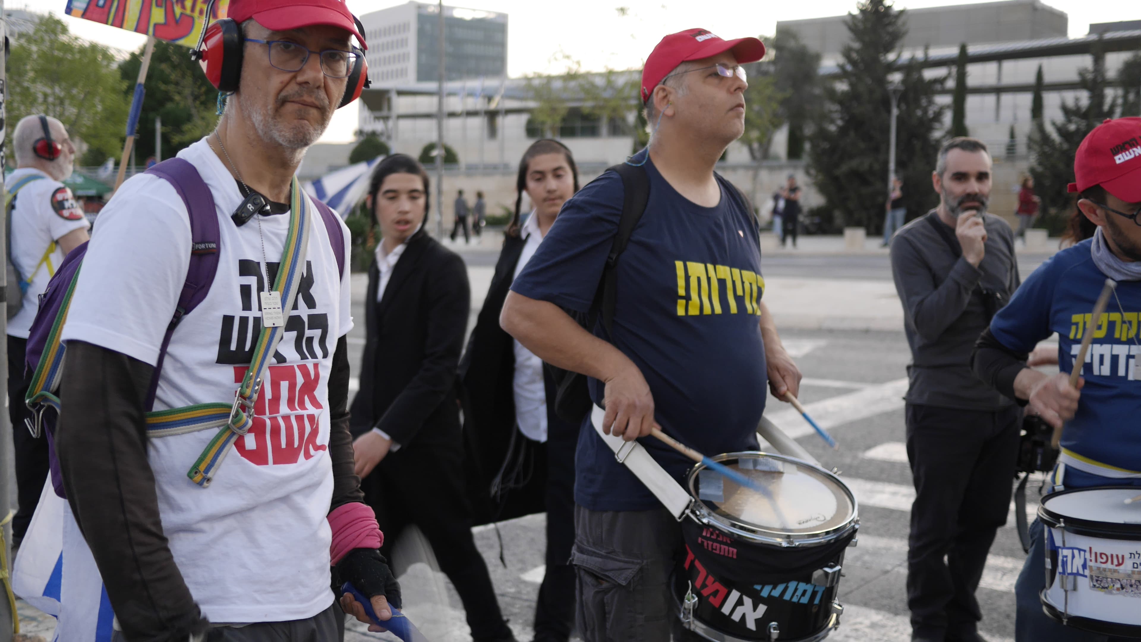 Israelis angry with their government have been beating drums and surrounding the parliament building after launching huge demonstrations over the weekend.