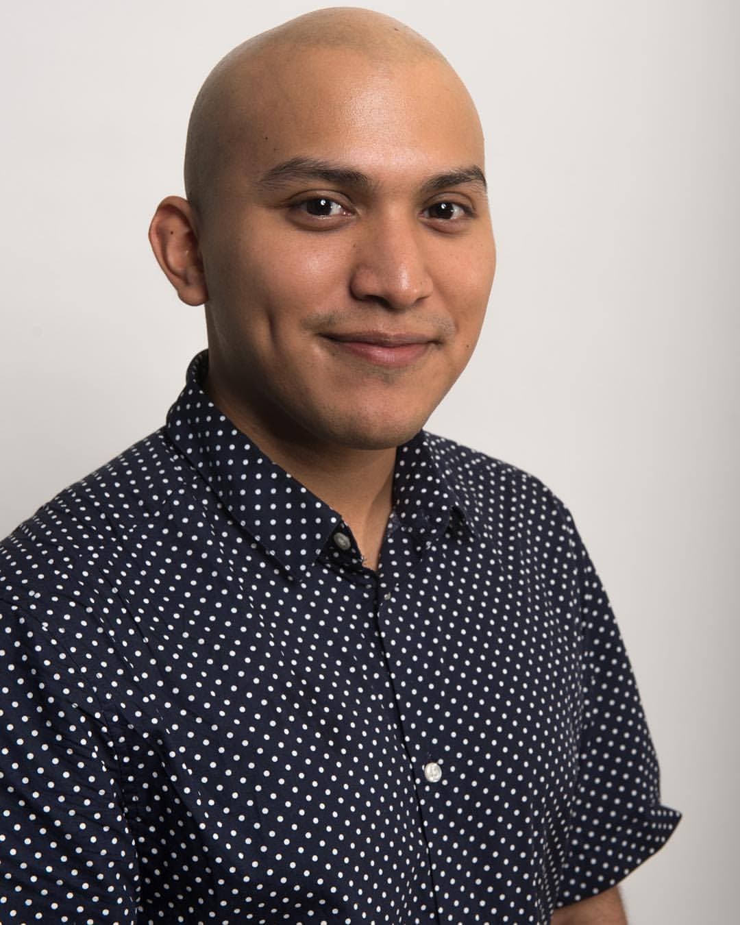 Portrait of man, smiling at camera
