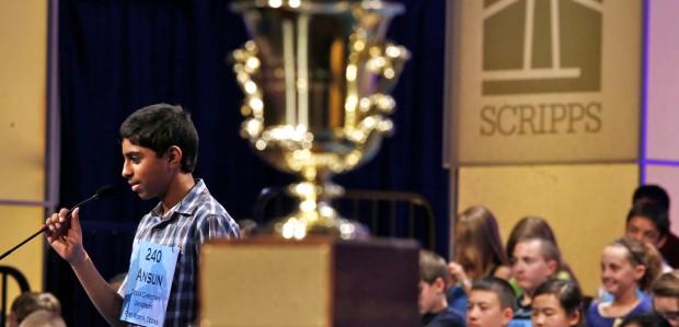 Ansun Sujoe, of Fort Worth, spells a word correctly behind the winner's trophy during the 2013 Scripps National Spelling Bee, May 29, 2013 (Photo: Reuters/Larry Downing)