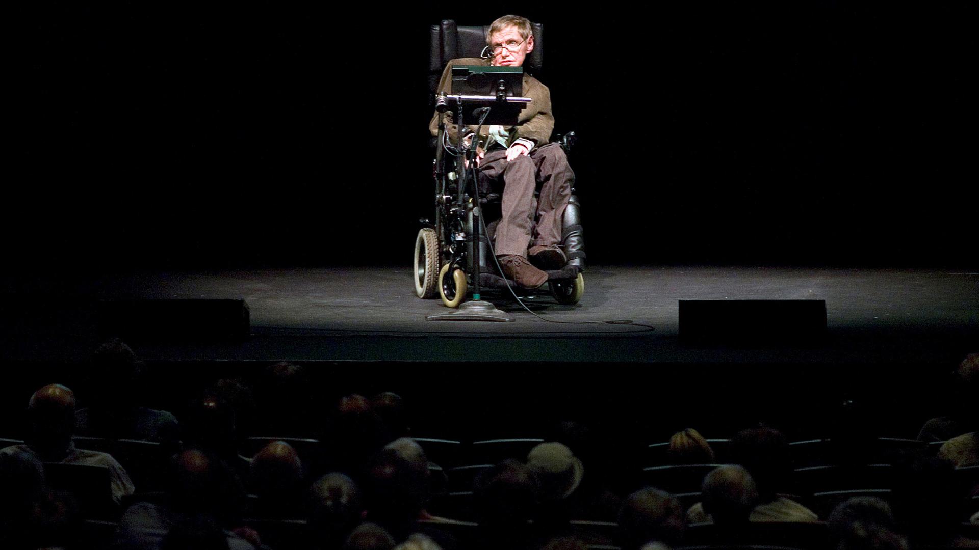 Stephen Hawking onstage discussing theories on the origin of the universe in a talk in Berkeley, California, 2007.