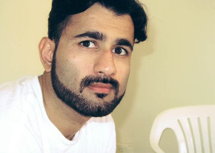 Magid Khan gained political asylum in the United States in 1998.