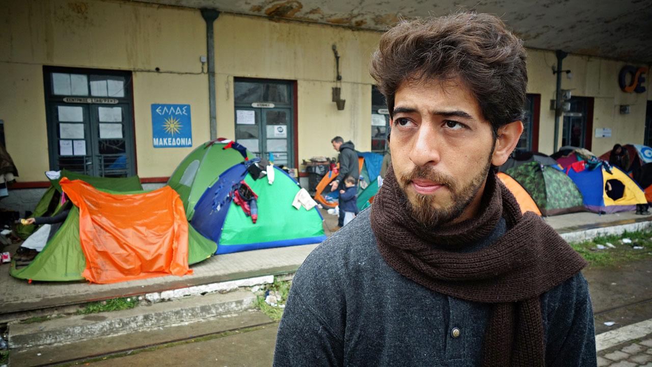 Ibrahim Esmael Ibrahim at the train station in Idomeni, Greece. As a teenager, he worked as a translator with the US military in Iraq.