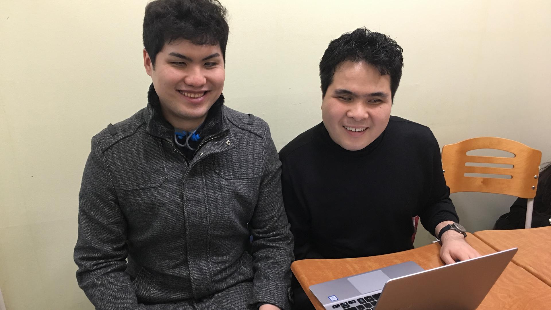Lee Chang-hoo (l) and Kwon Soon-chul (r) started a baseball podcast, along with another visually impaired baseball fan. But they don't tell their listeners that they're blind. "They probably think we're just average, amateur sports fans."