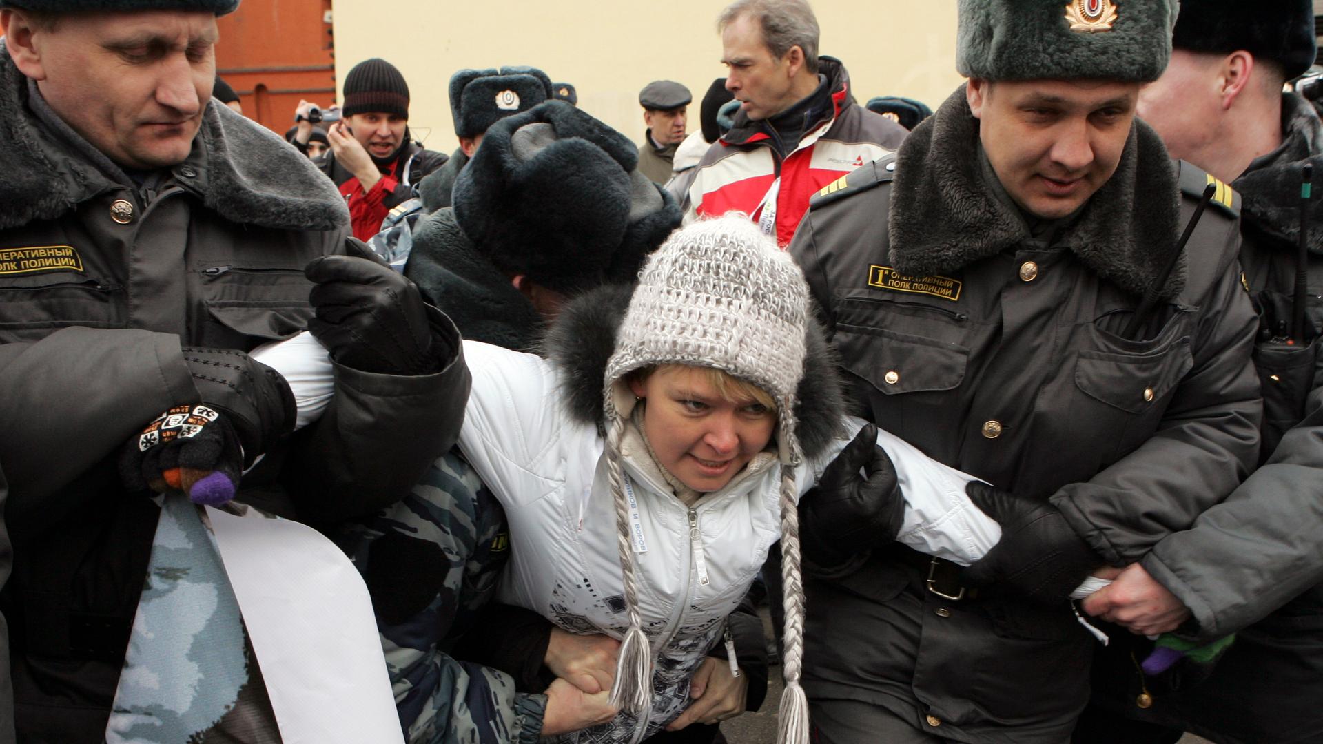 Police detain environmental activist Evgenia Chirikova during an opposition rally in Moscow in 2012. Chirikova's efforts to save a protected forest ultimately made her a leading critic of the Russian government. Now after years of pressure from the govern