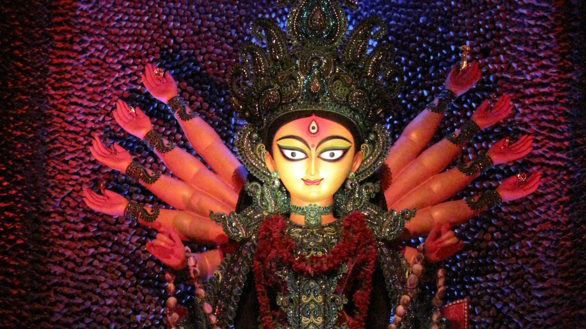 Each neighborhood in Kolkata has its own celebration with a different artist creating the idol of Durga, showing her killing the demon.