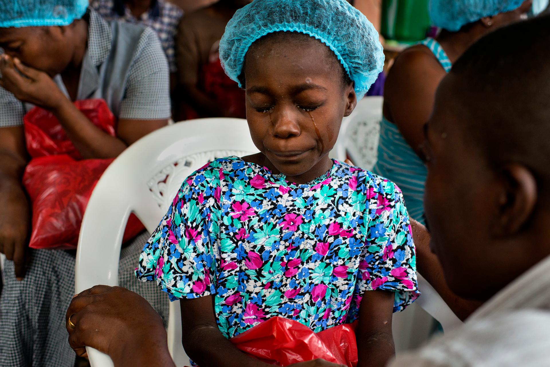 Michel du Cille's haunting photographs from the Ebola front included this one of Esther Tokpah, 11, orphaned in Monrovia, Liberia
