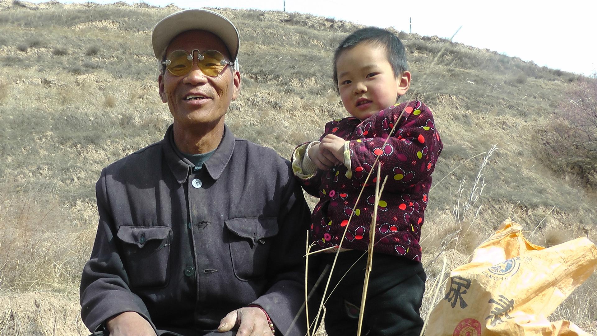In the parched county of Pengyang, farmer Mi Zhangzhong says a local tree-planting campaign has helped bring more rain.