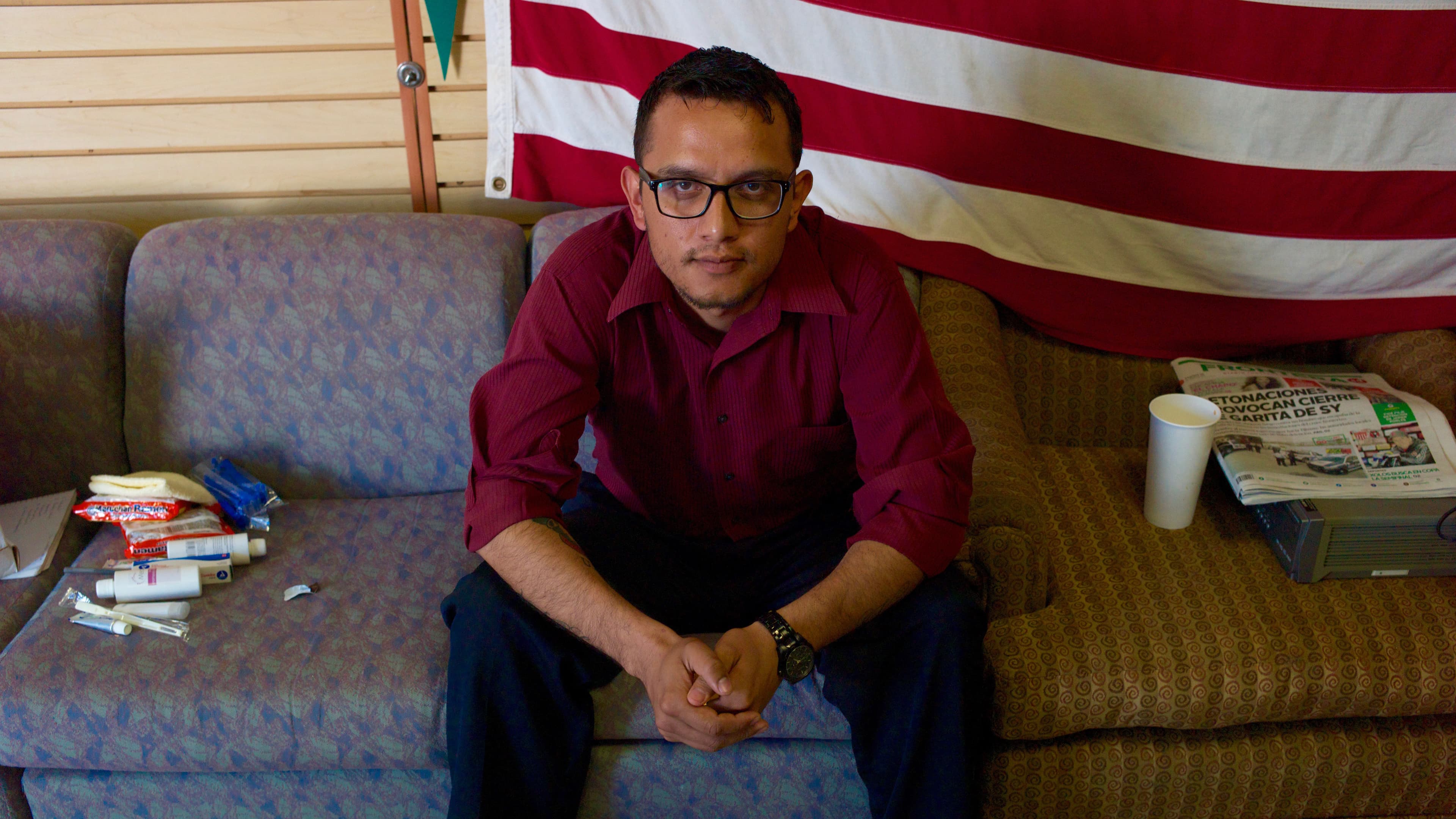 Daniel Torres sits on a sofa