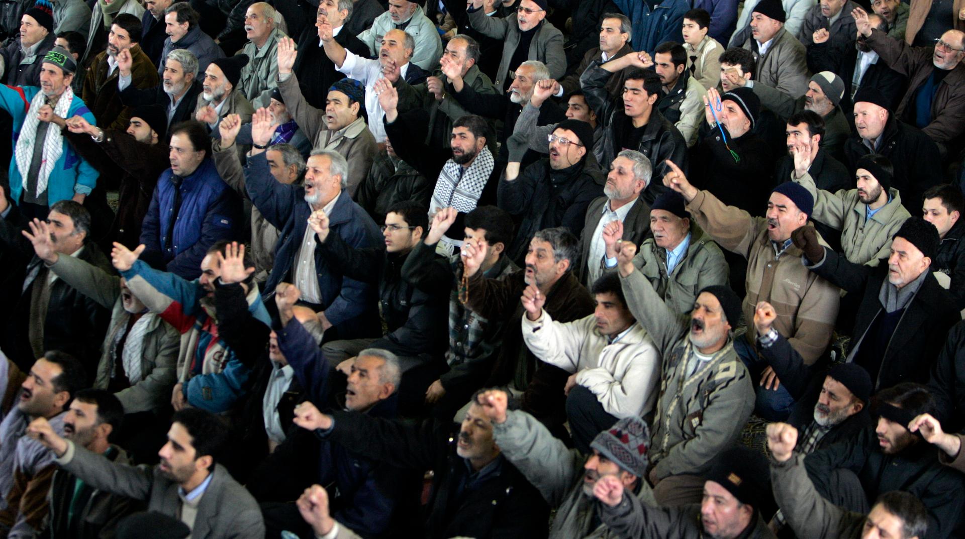 Iranian worshippers chant "death to America" during Friday prayers in Tehran, Iran January 27, 2006.