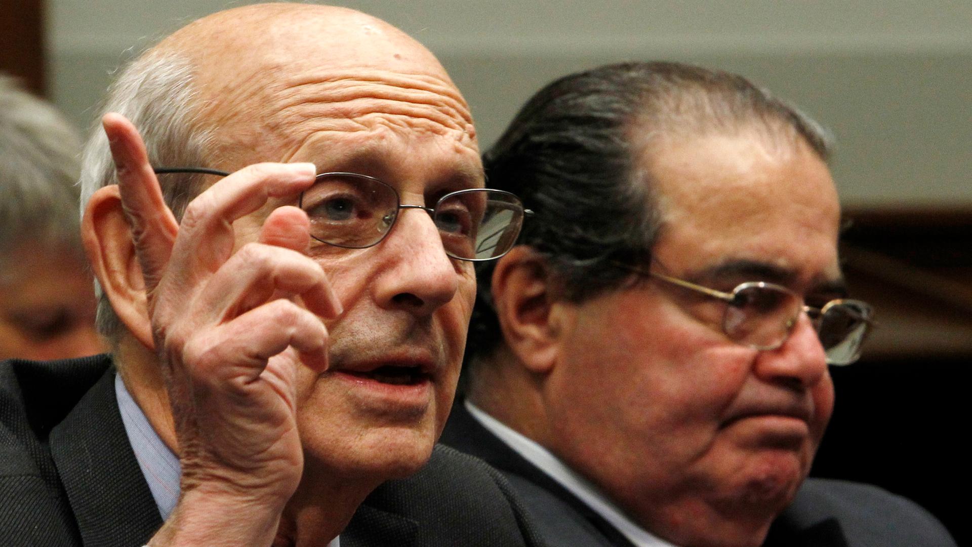 Supreme Court Justices Stephen Breyer and Antonin Scalia testify before a House Judiciary Commercial and Administrative Law Subcommittee hearing in 2010.