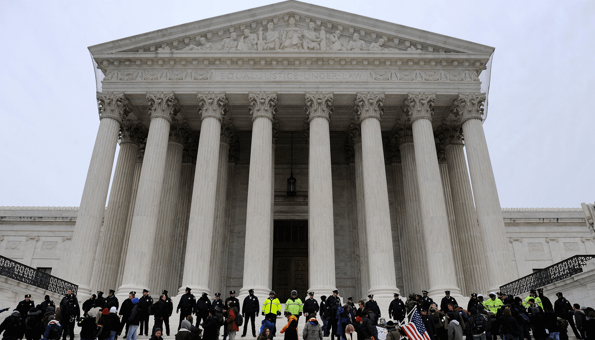 Demonstrators on the steps of the U.S. Supreme Court building, on the anniversary of the Citizens United decision, in Washington, January 20, 2012.