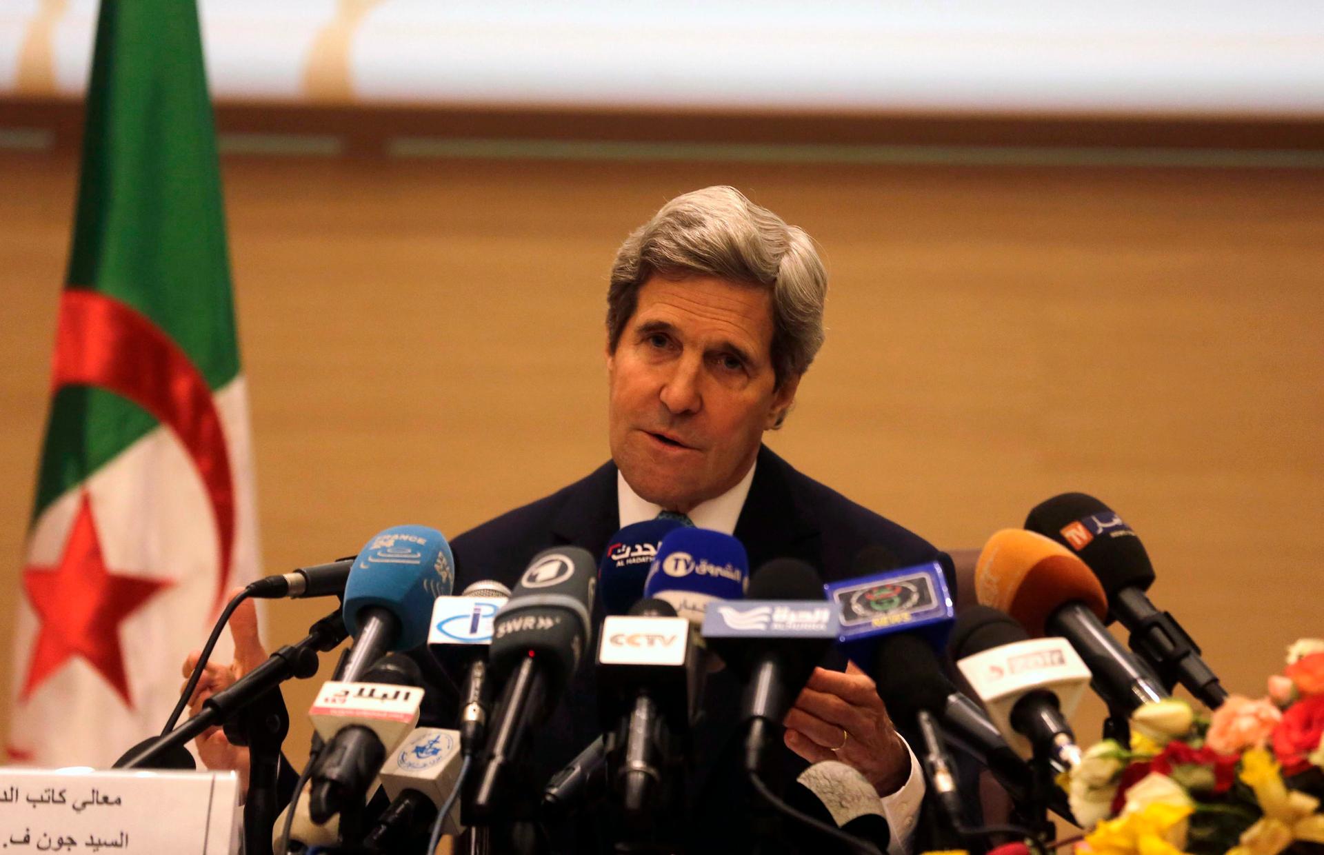 U.S. Secretary of State John Kerry addresses a news conference at the foreign ministry in the Algerian capital of Algiers on April 3, 2014.