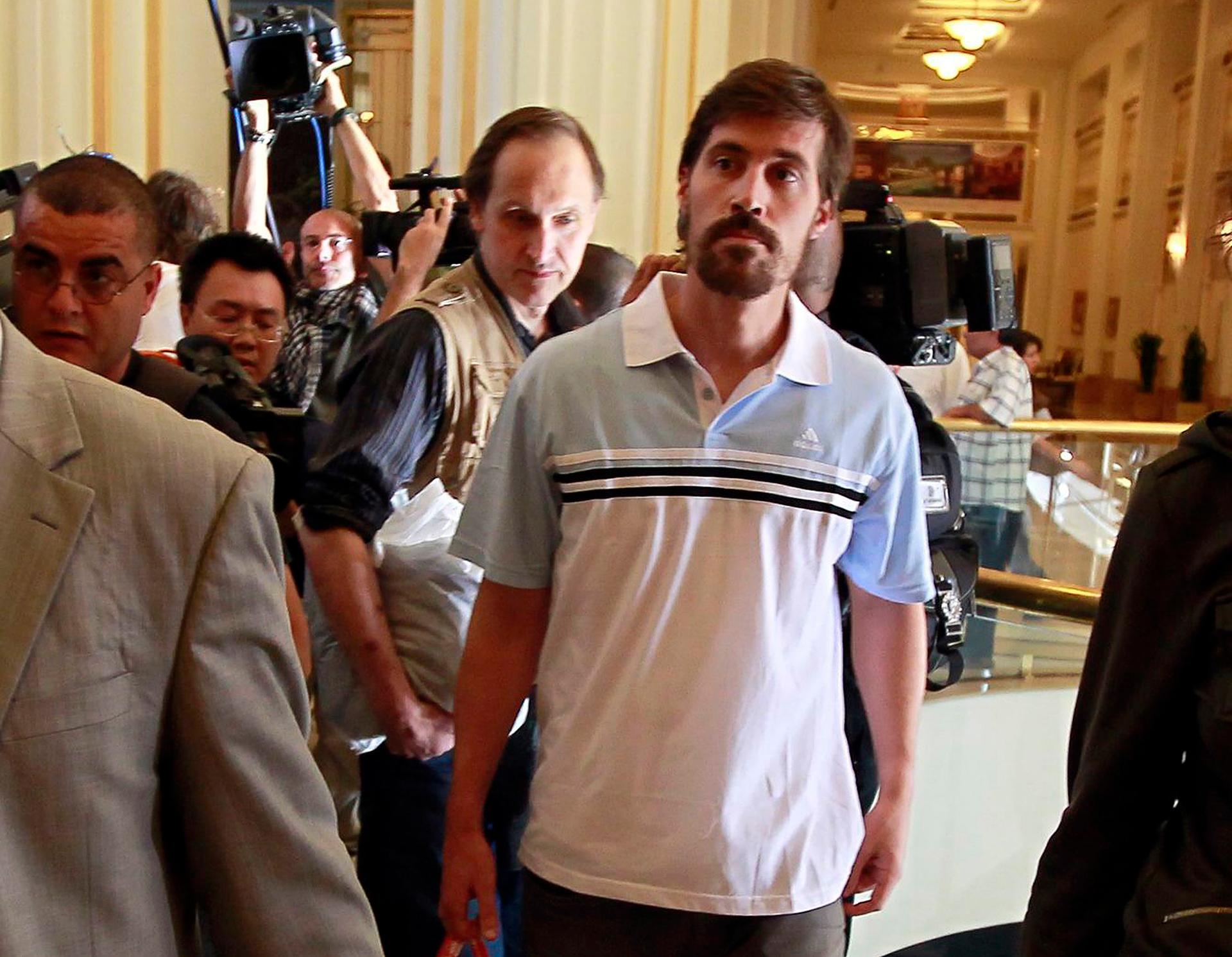 American journalist James Foley arrives at the Rixos hotel in Tripoli after being released from capitivity by the Libyan government on May 18, 2011.