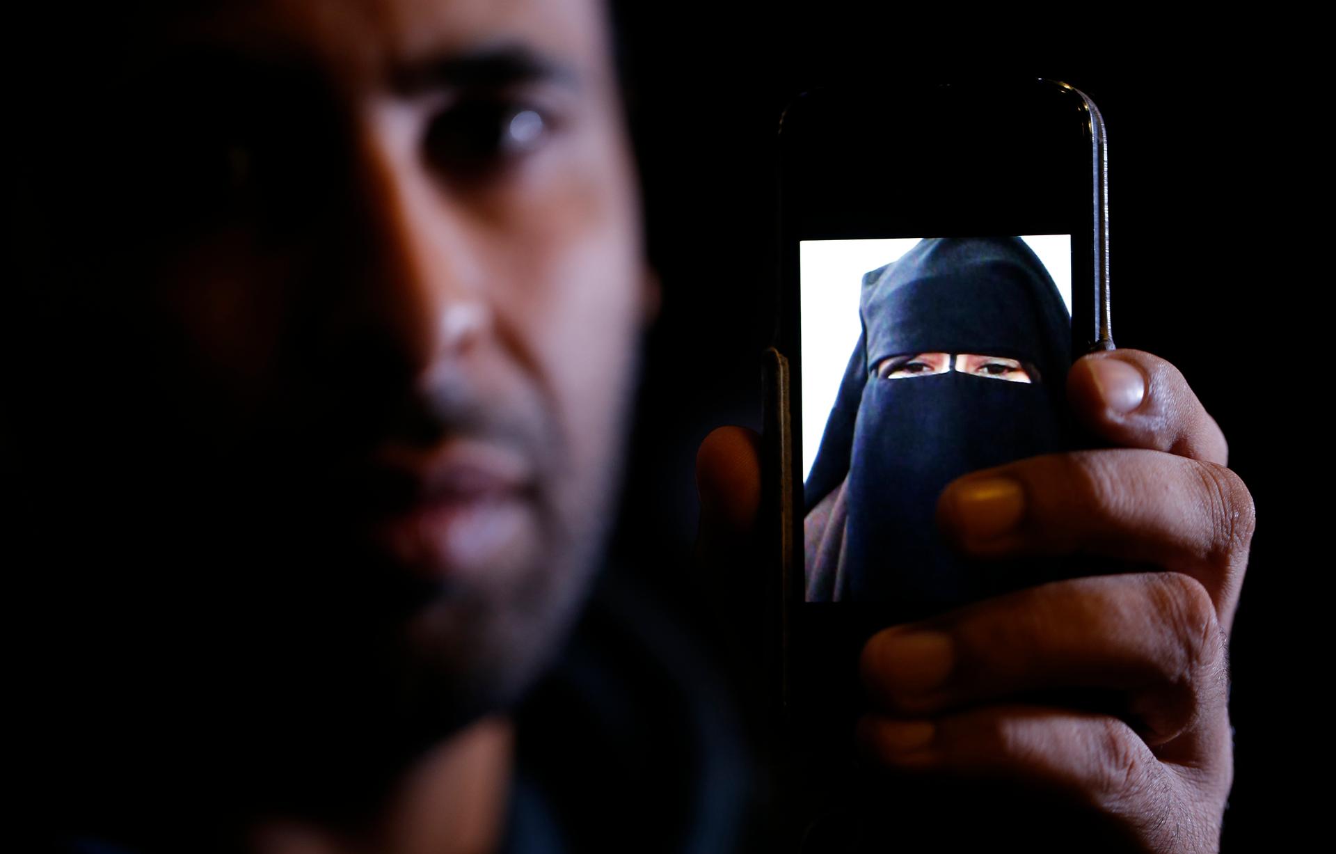 Foad, the brother of 15-year-old Nora, who left her home in Avignon for Syria nine months ago, shows a portrait he took last September, during an interview on October 6, 2014.