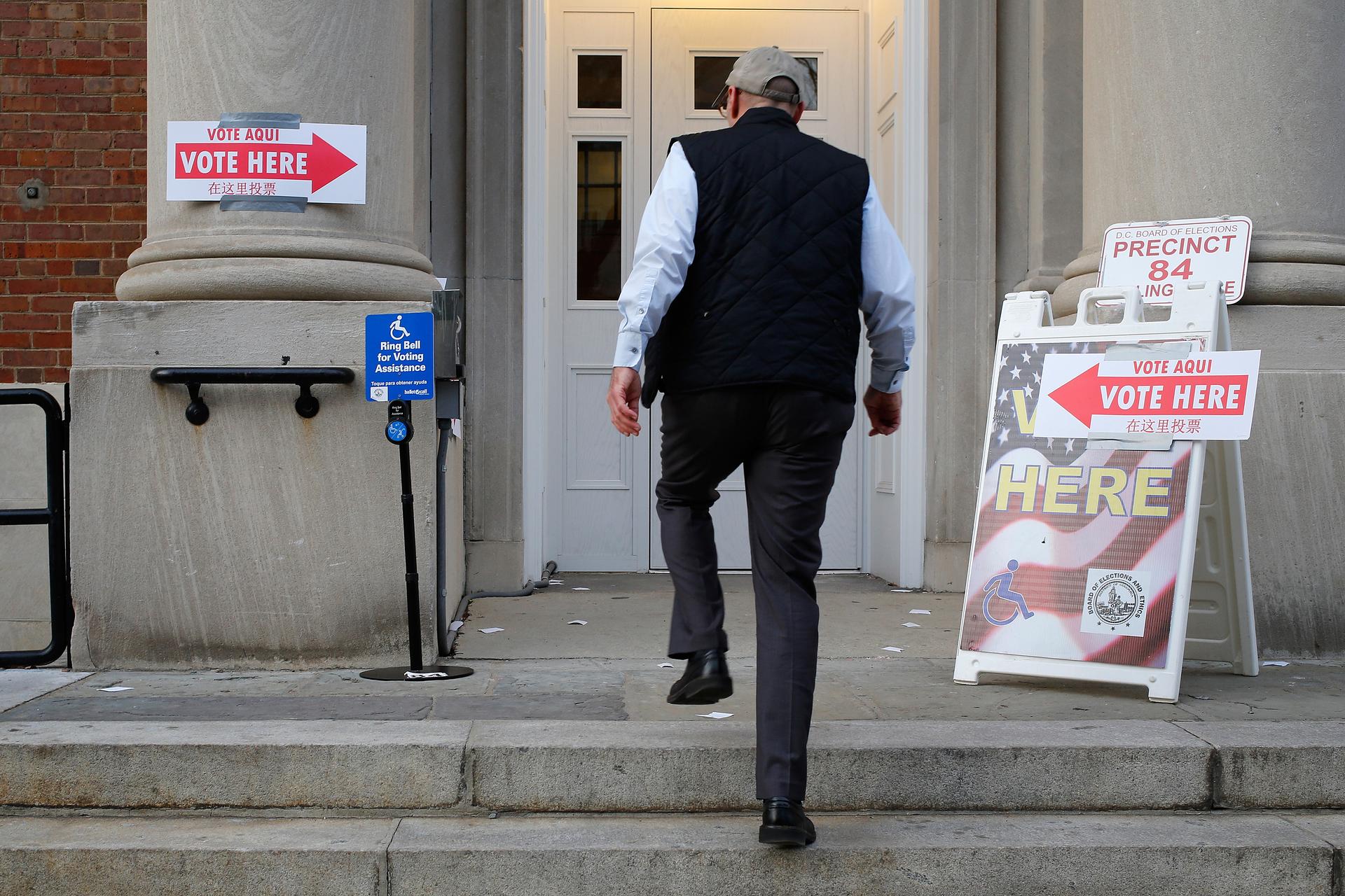 A voter enters the polling place on Election Day at Stuart-Hobson Middle School in Washington, DC, on November 4, 2014.