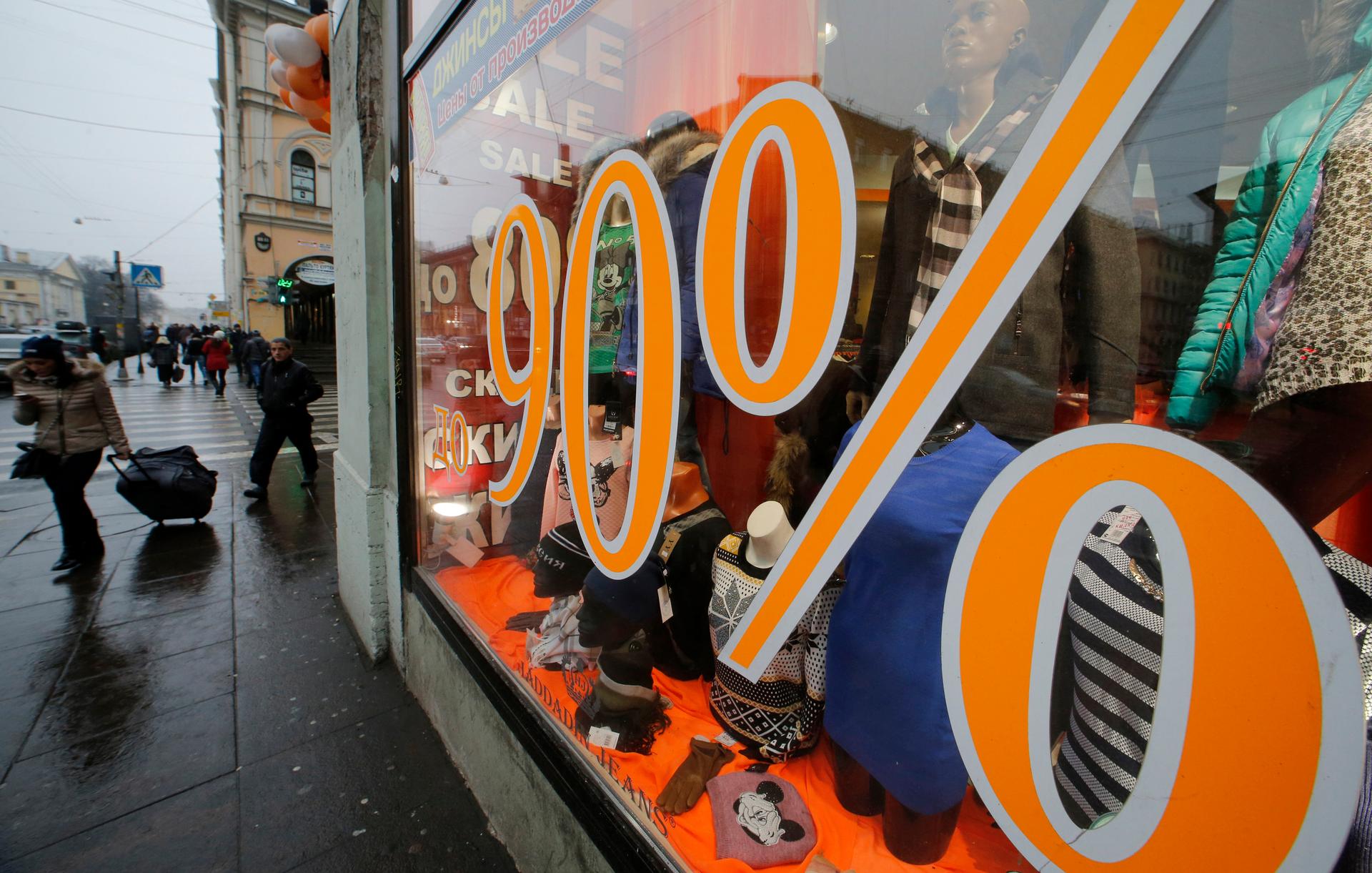 A St. Petersburg shop advertises a sale as Russia's ruble crashes to unprecedented lows Tuesday.