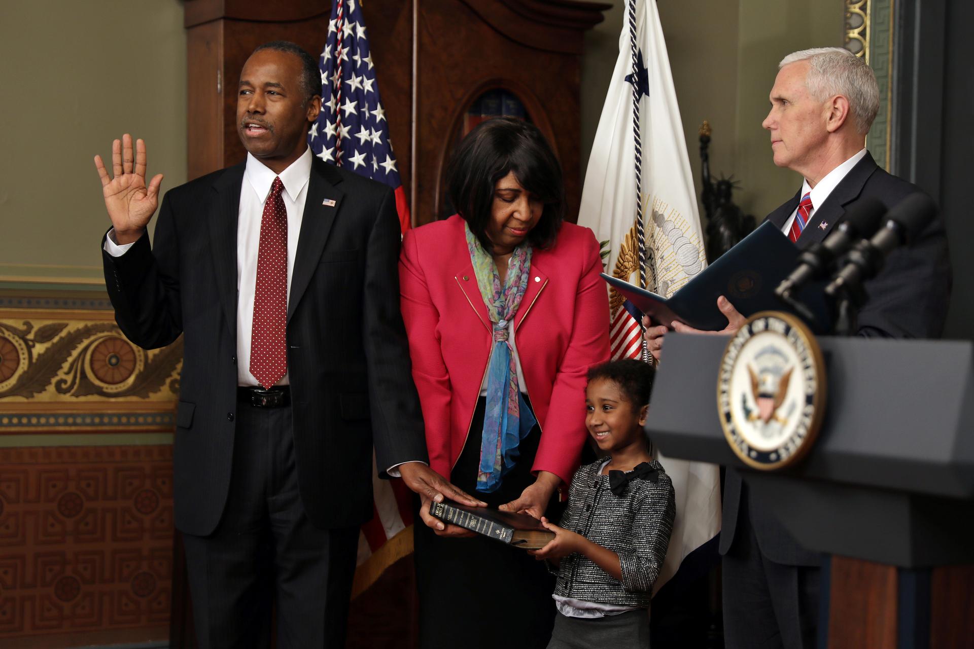 Ben Carson, the new secretary of HUD is sworn in by VP Mike Pence