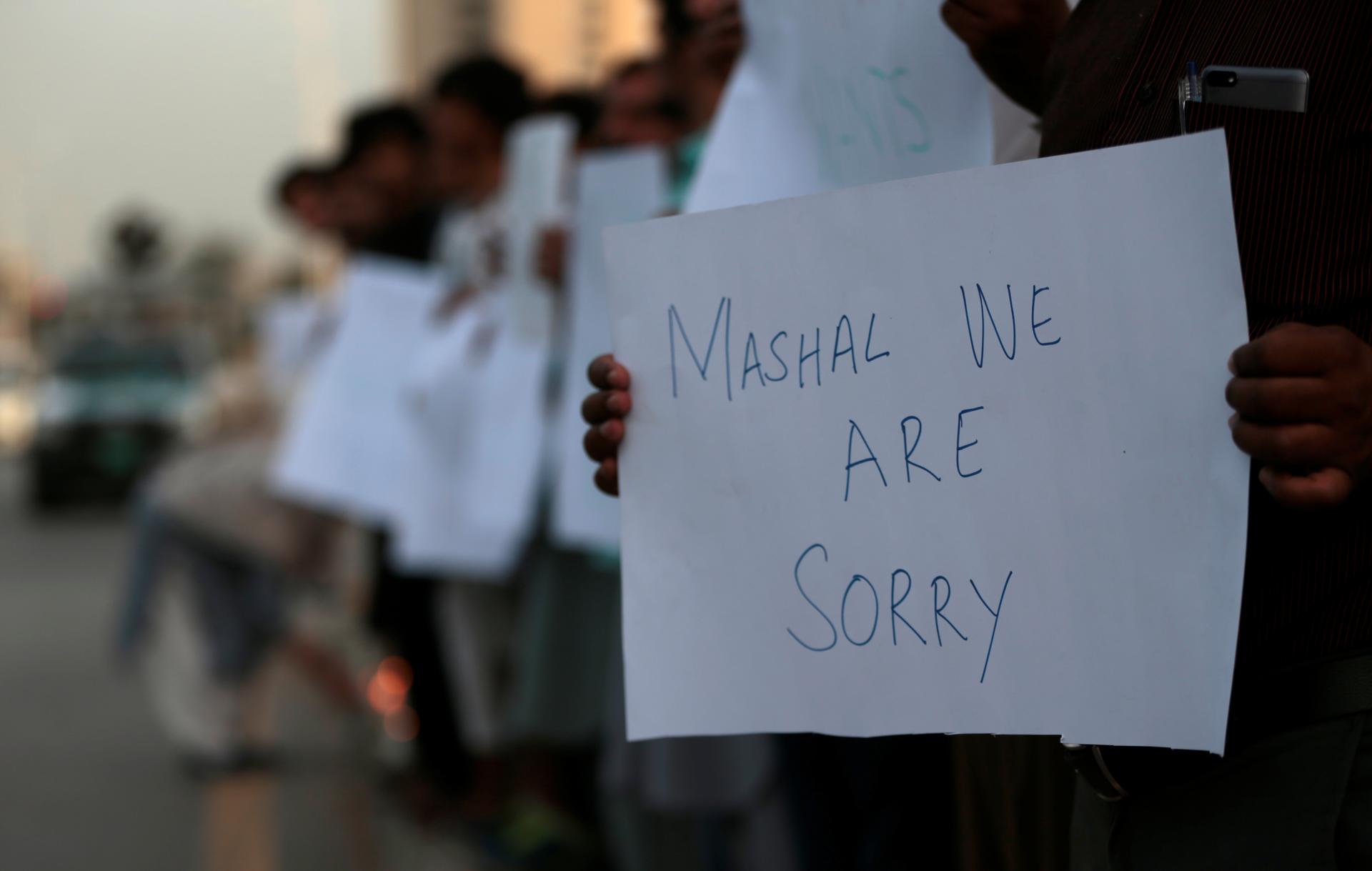 Protesters hold placards condemning the killing of university student Mashal Khan, after he was accused of blasphemy, during a protest in Islamabad, Pakistan