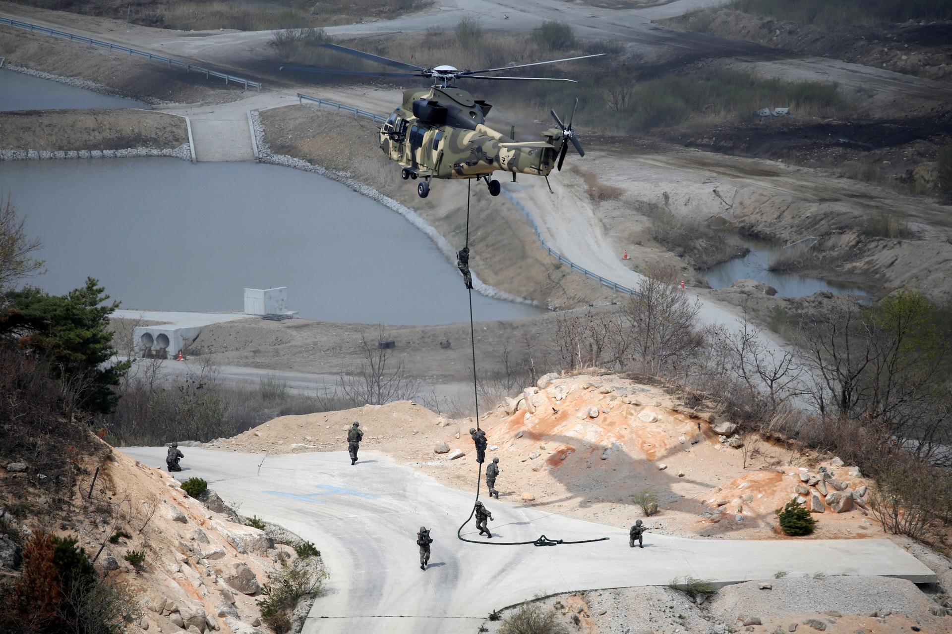 South Korean Army soldiers rappel down during a U.S.-South Korea joint live-fire military exercise, at a training field, near the demilitarized zone, separating the two Koreas in Pocheon, South Korea April 21, 2017.