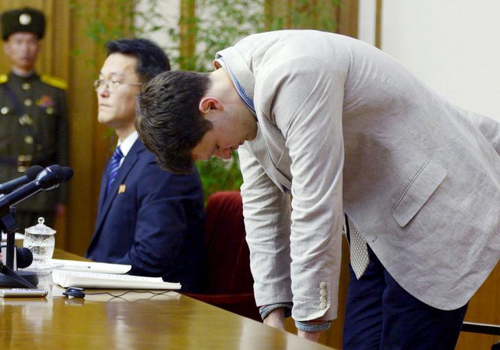 American student Otto Warmbier bows appears during a news conference in Pyongyang, North Korea on February 29, 2016. He's been convicted and sentenced to 15 years of hard labor by North Korea's supreme court for trying to steal a banner.