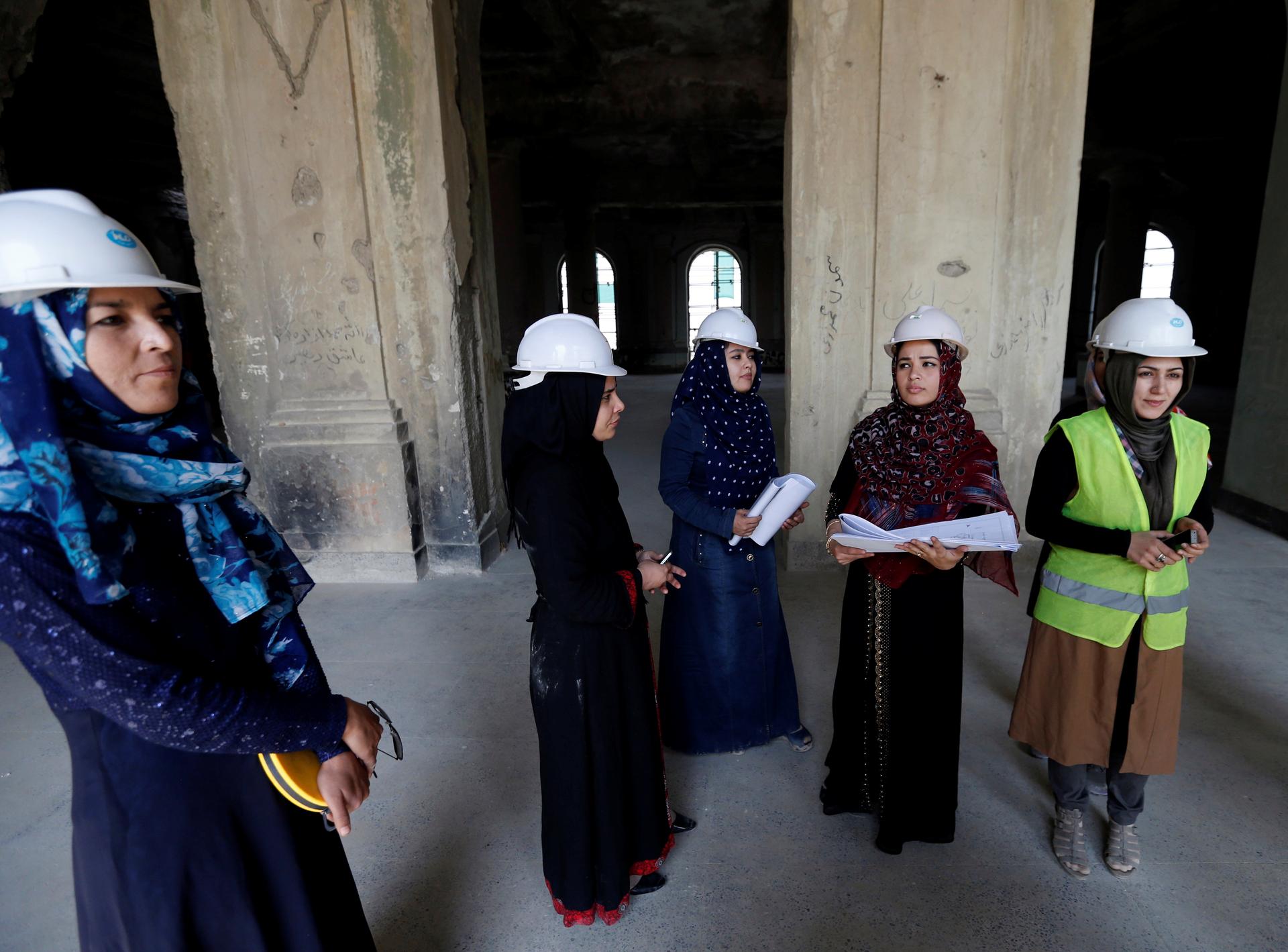 Afghan female engineers work inside the ruined Darul Aman palace in Kabul, Afghanistan October 2, 2016.
