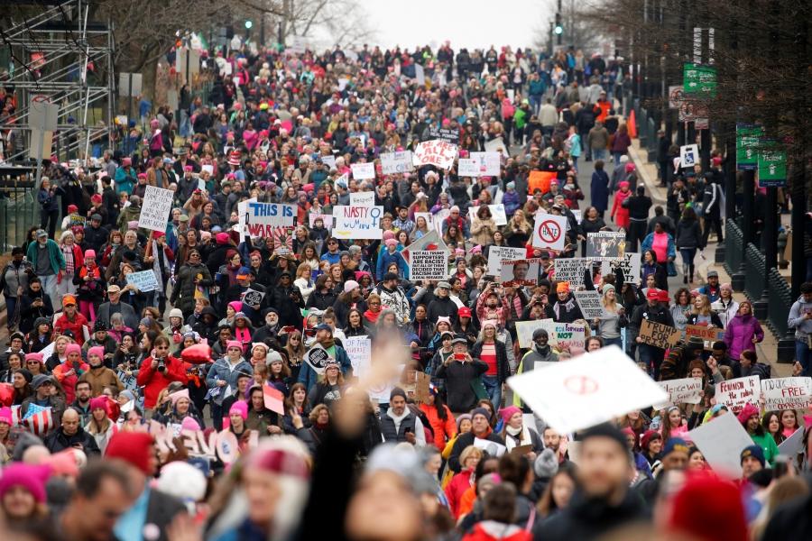 A crowd of people marching in Washington DC