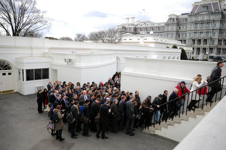 ​Members of the media line up to attend a news conference between British Prime Minister Theresa May and U.S. President Donald Trump at the White House in Washington, DC, U.S.