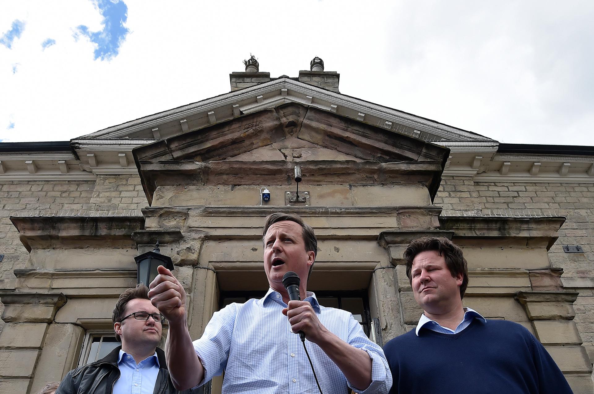 Britain's Prime Minister David Cameron addresses locals whilst campaigning in England