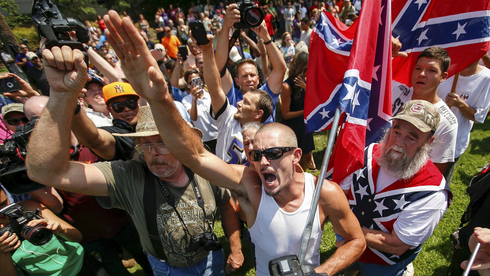 Demonstrators rally at the statehouse in Columbia, South Carolina, July 18, 2015, after state officials decided to remove the Confederate battle flag from the grounds.