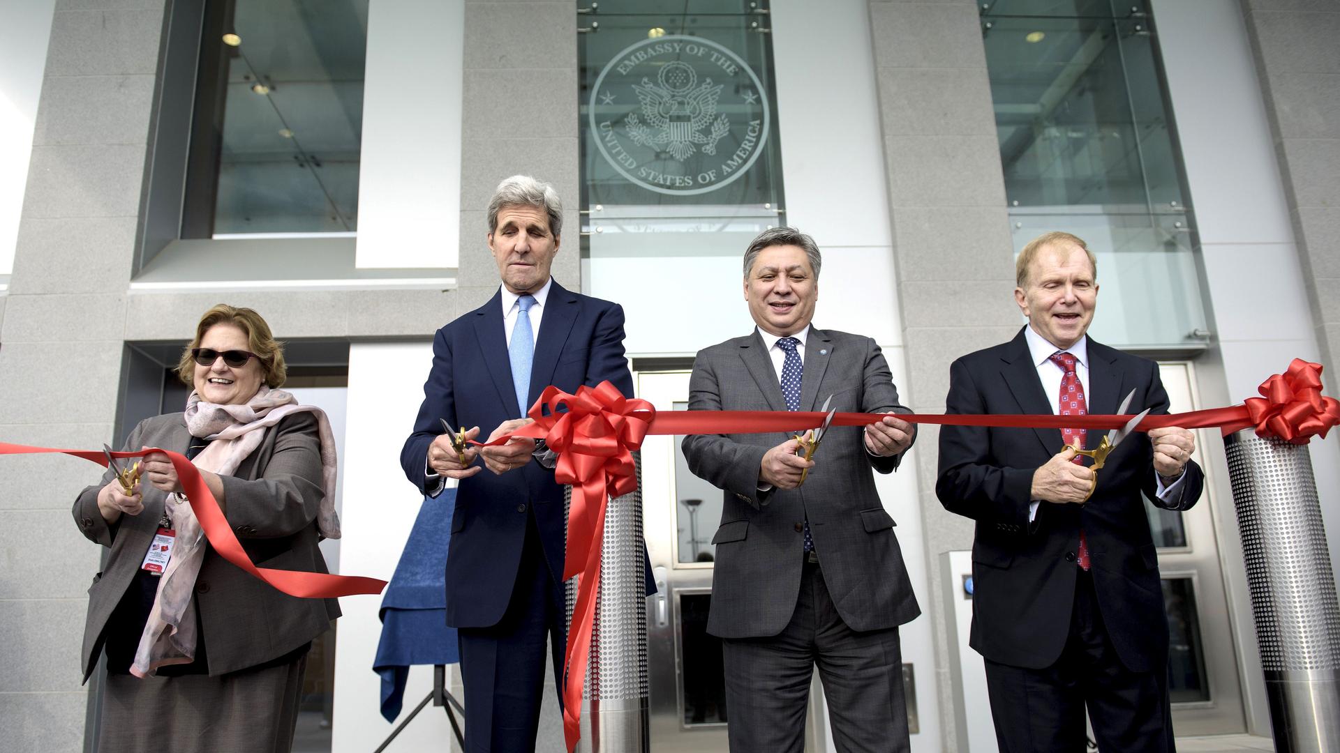 Secretary of State John Kerry takes part in a ceremony in October to open the new US embassy in Bishkek, Kyrgyzstan, together with US ambassador, Sheila Gwaltney (L). Gwaltney was confirmed by the Senate in August but dozens of her peers are still pending