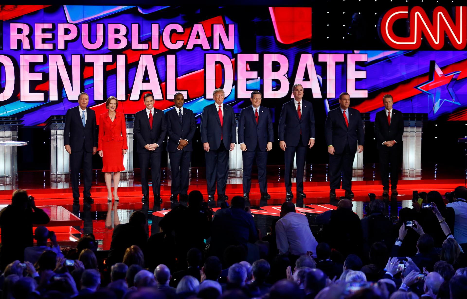 John Kasich, Carly Fiorina, Marco Rubio, Ben Carson, Donald Trump, Ted Cruz, Jeb Bush, Chris Christie and Rand Paul (L-R) pose before the start of the debate.