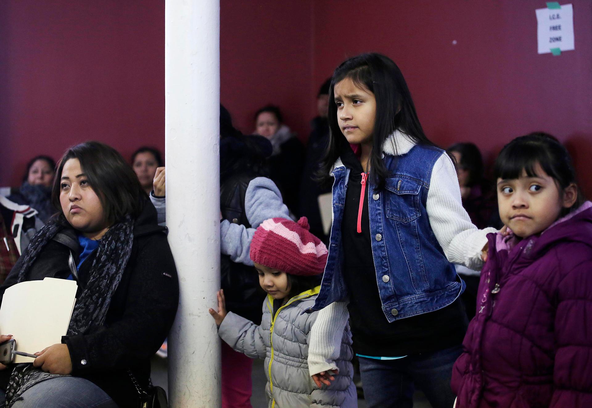 Migrants attend a workshop for legal advice