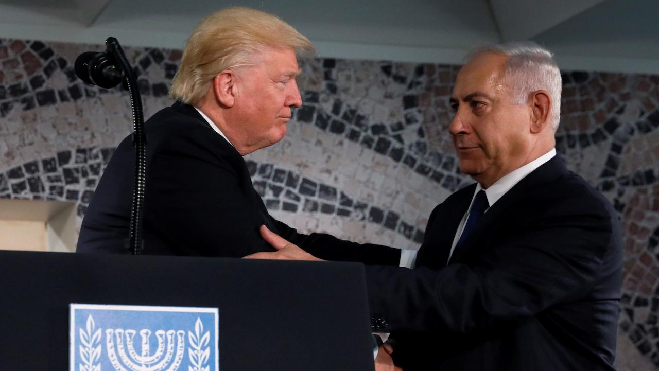 Trump embraces Netanyahu before his remarks at the Israel Museum in Jerusalem