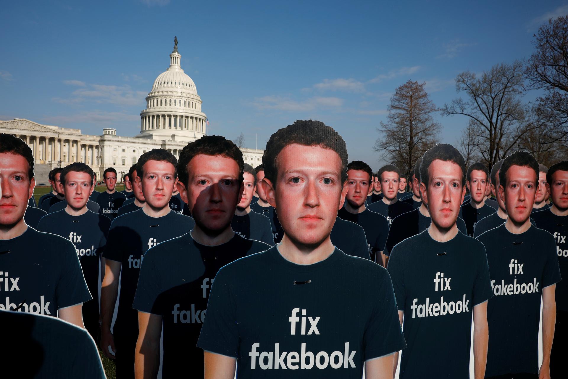 Dozens of cardboard cutouts of Facebook CEO Mark Zuckerberg are seen during an Avaaz.org protest outside the U.S. Capitol in Washington, U.S., April 10, 2018.