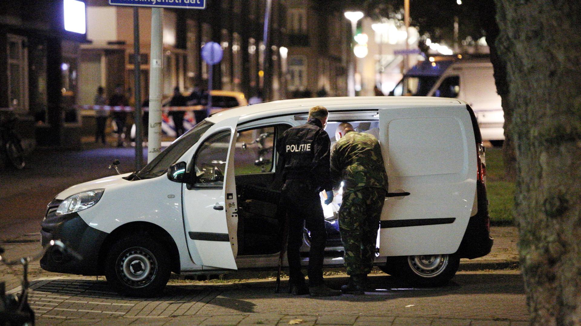Police investigates a van with Spanish license plate packed with gas canisters in the vicinity of the concert venue Maassilo, after a concert was cancelled because of a terror threat, in Rotterdam.