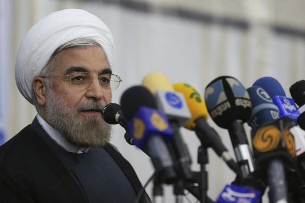 Iranian President-elect Hassan Rohani speaks to the media following a visit to the Khomeini mausoleum in Tehran, June 16, 2013.