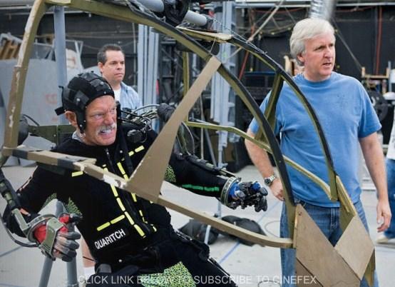 Actor Stephen Lang performing in an "amp suit," with director James Cameron by his side