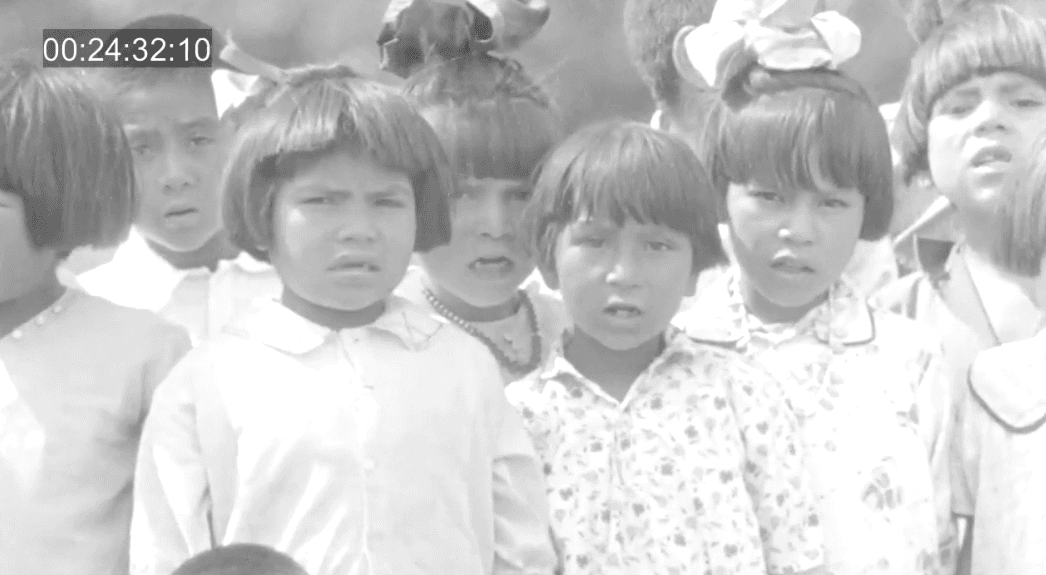 Native children sing "Ten Little Indians" at Albuquerque Indian School.